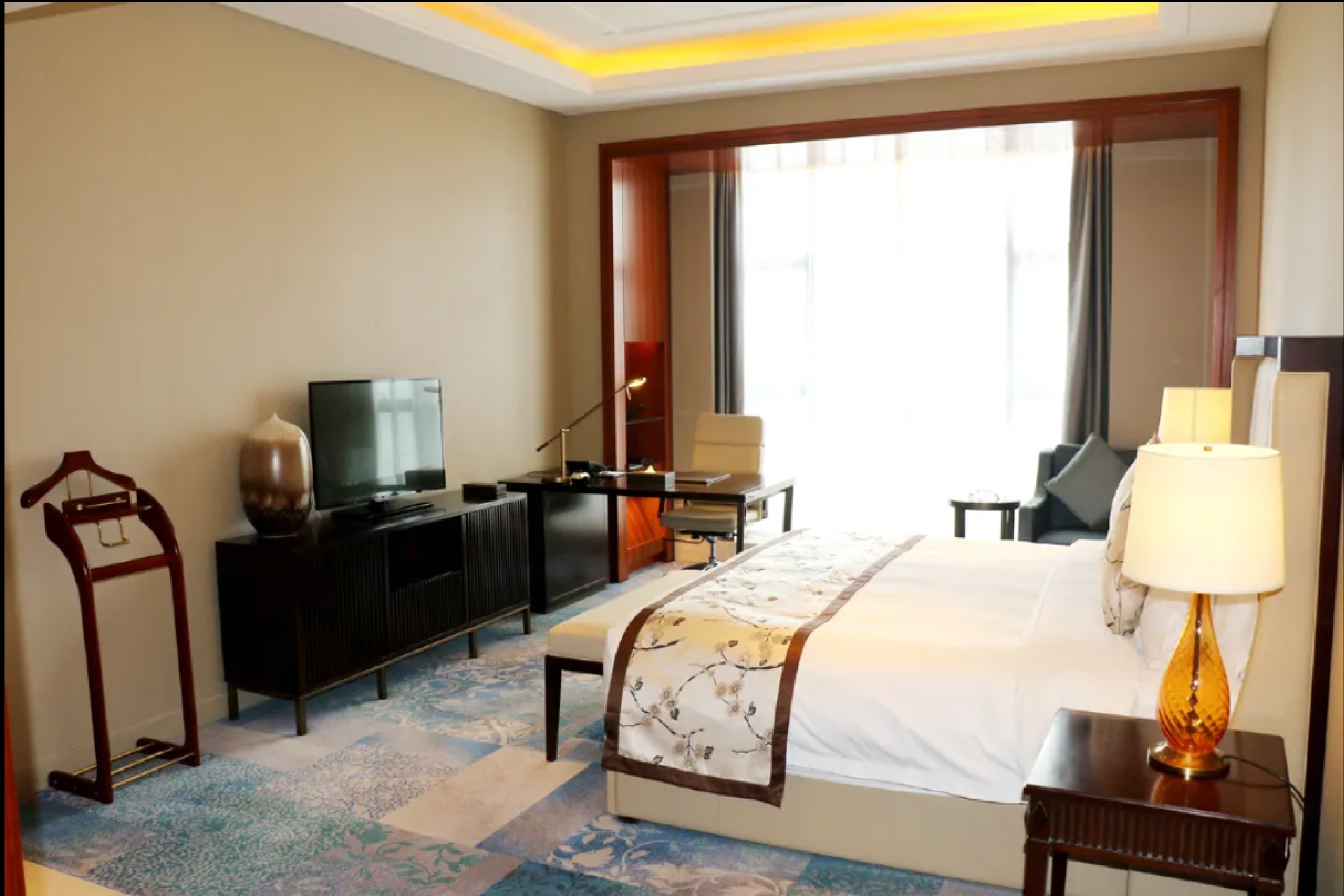 Guest room at the Wyndham Urumqi North in Wujiaqu, Other than US/Canada